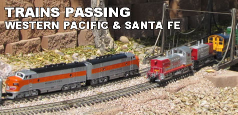 Western Pacific passing Santa Fe diesels